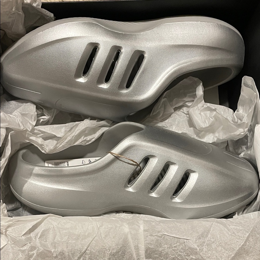 Adidas AdiFOM IIInfinity Mules in Metallic Silver Size: Mens US 11 / Womens 13